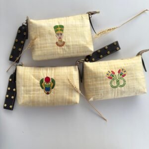 Authentic Papyrus Clutch – Pharaonic Art Edition Handmade from natural Egyptian papyrus, this unique clutch features vibrant Pharaonic embroidery that brings ancient heritage to modern fashion. Lightweight, stylish, and one-of-a-kind — perfect for daily wear, gifts, or special occasions. Carry a piece of Egypt… beautifully.